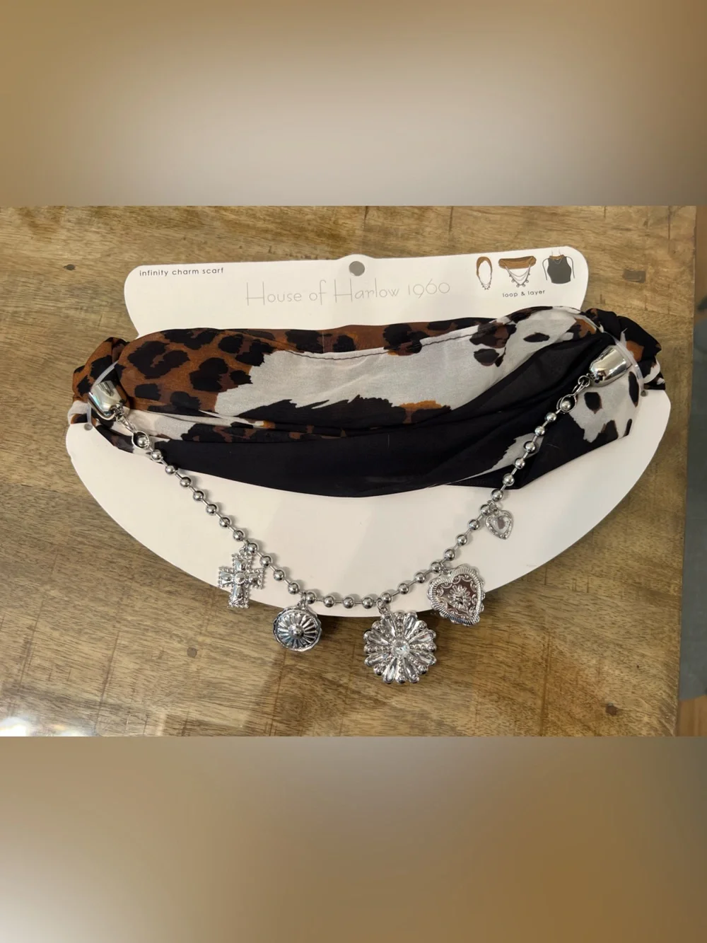 The House of Harlow 1960 leopard and black infinity charm scarf